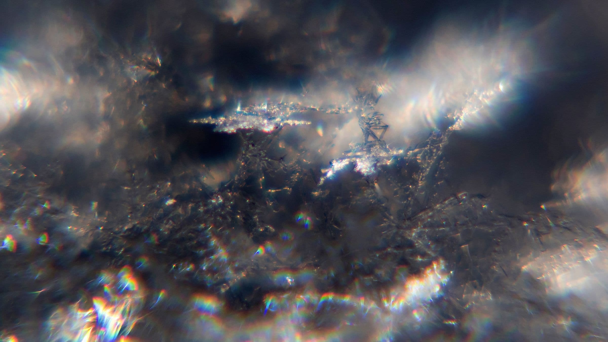 Ice crystals glittering in hard sunlight, in macro